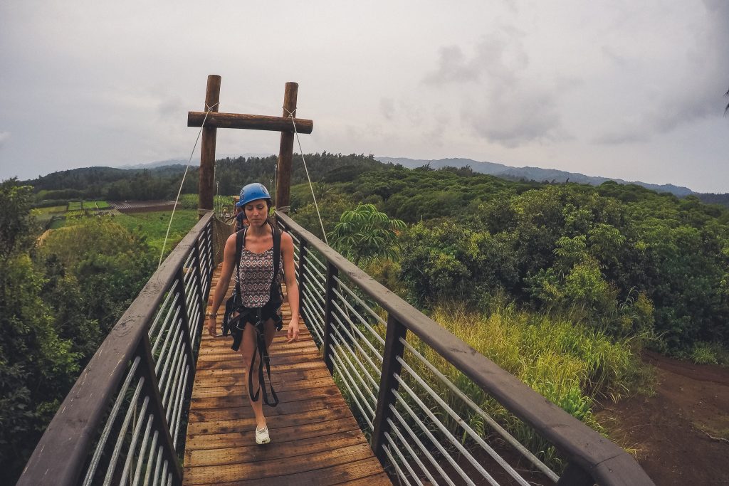 Climb Works in Oahu, girl walks down bridge