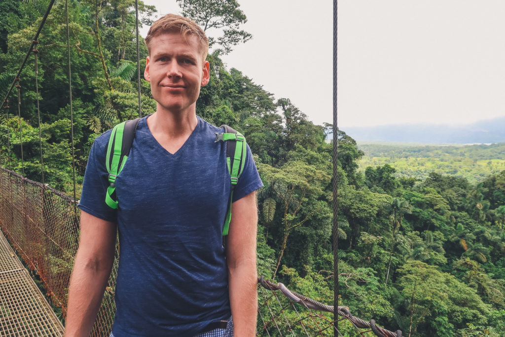 man explores Arenal Hanging Bridges Park