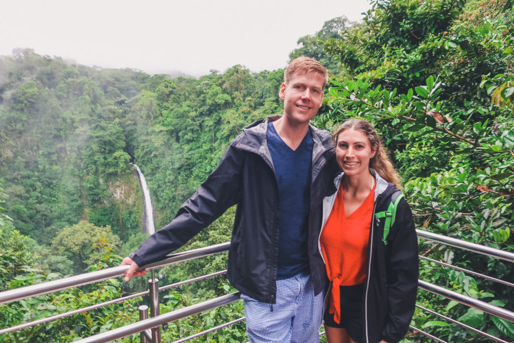 couple in Costa Rica, near waterfall