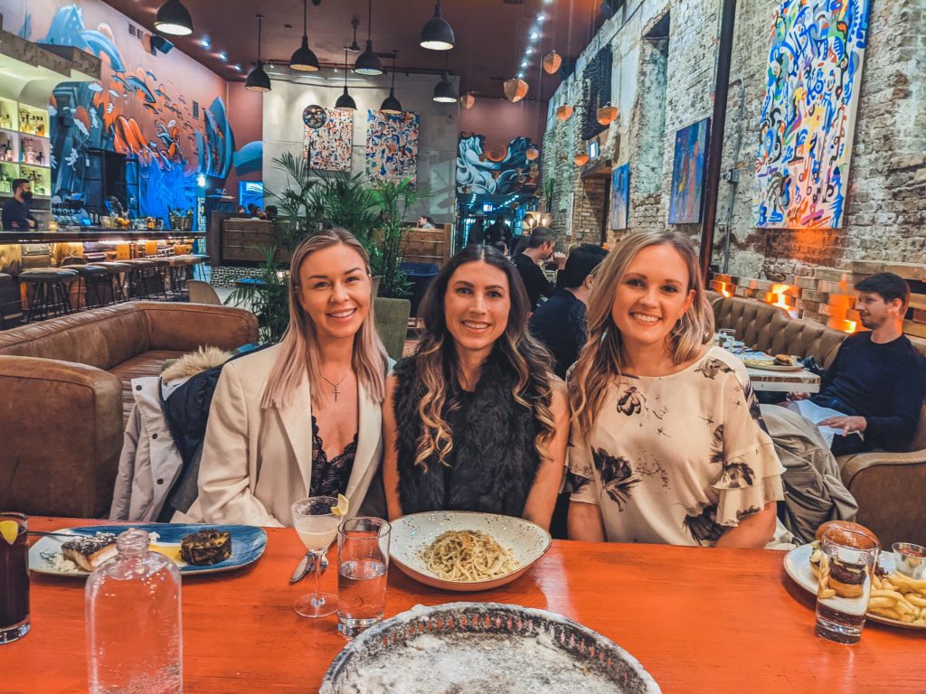 three women at Fulton Market Kitchen in Chicago