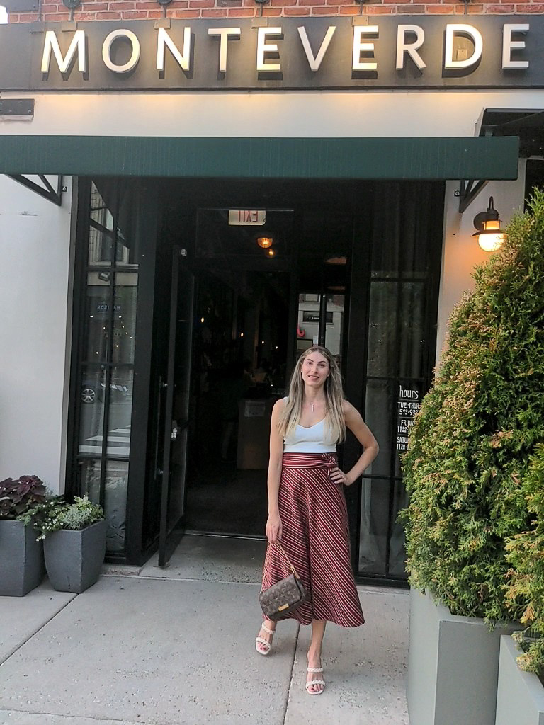 woman stands in front of monteverde chicago