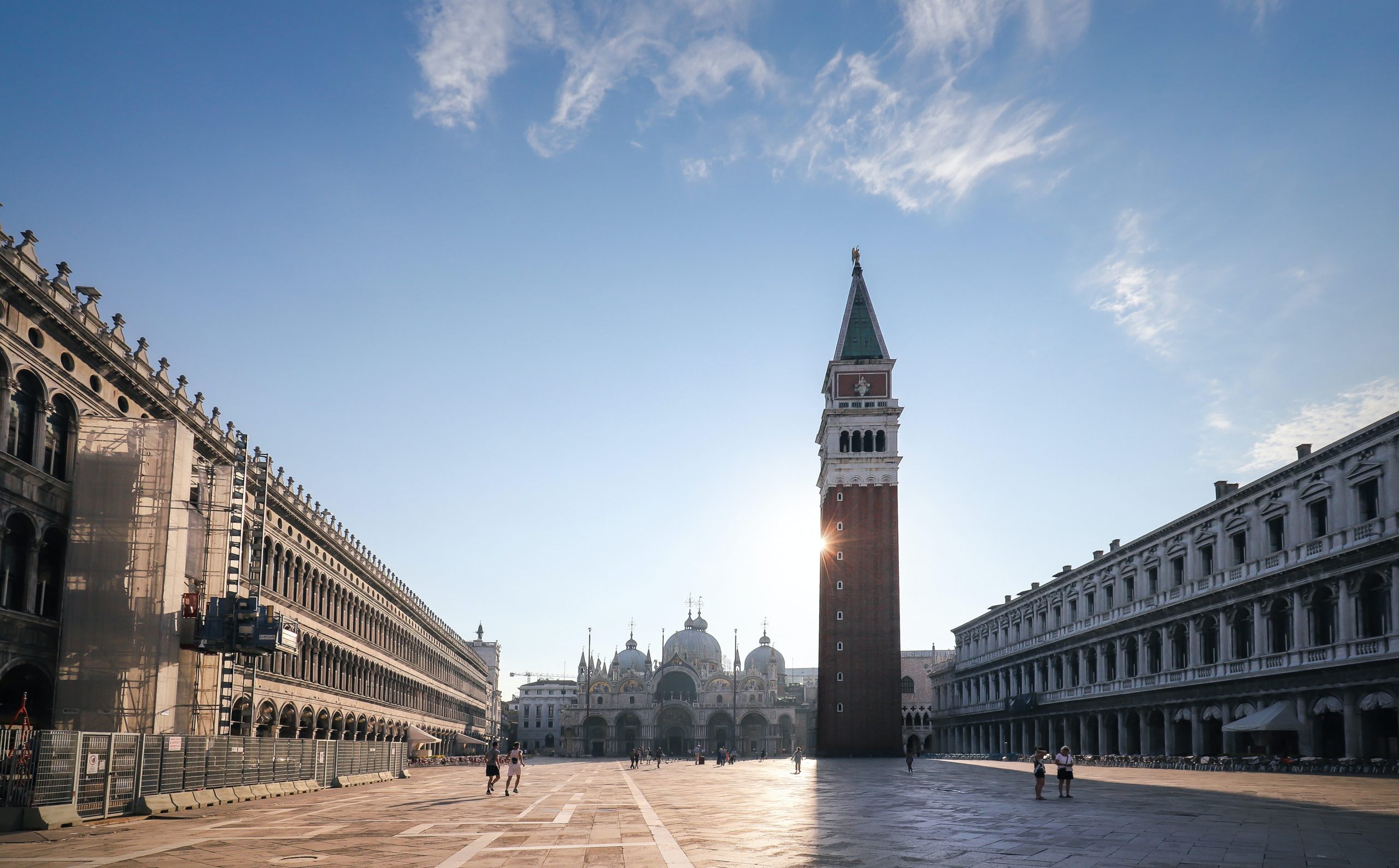 St. Mark's Square in Venice, St. Mark's clock tower is visible