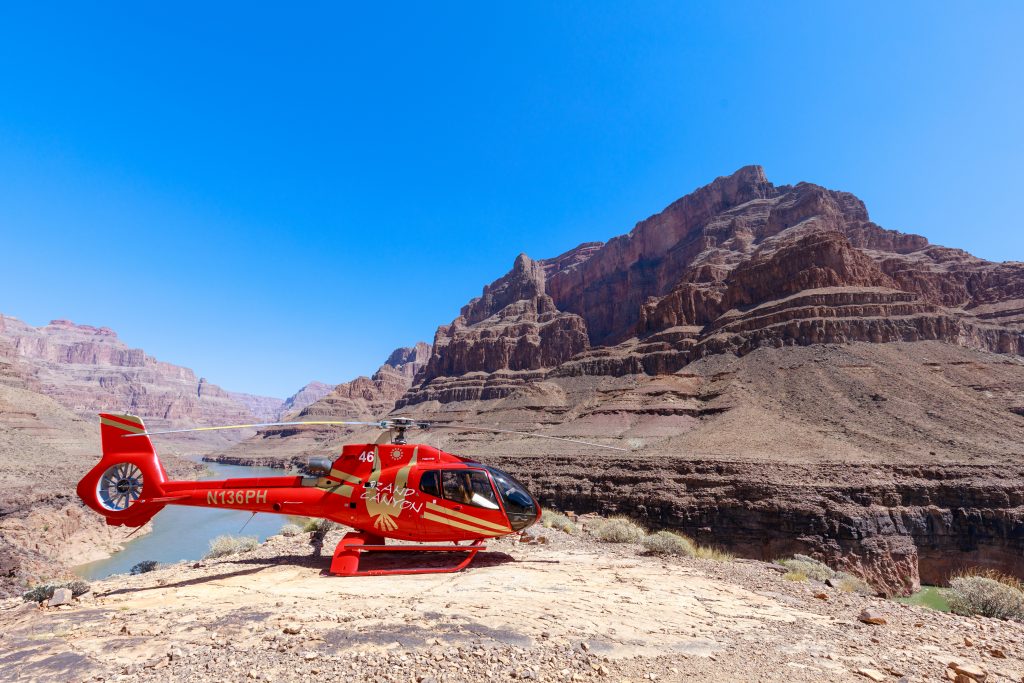 Scenic shot of a helicopter parked near the bottom of the Grand Canyon West Rim