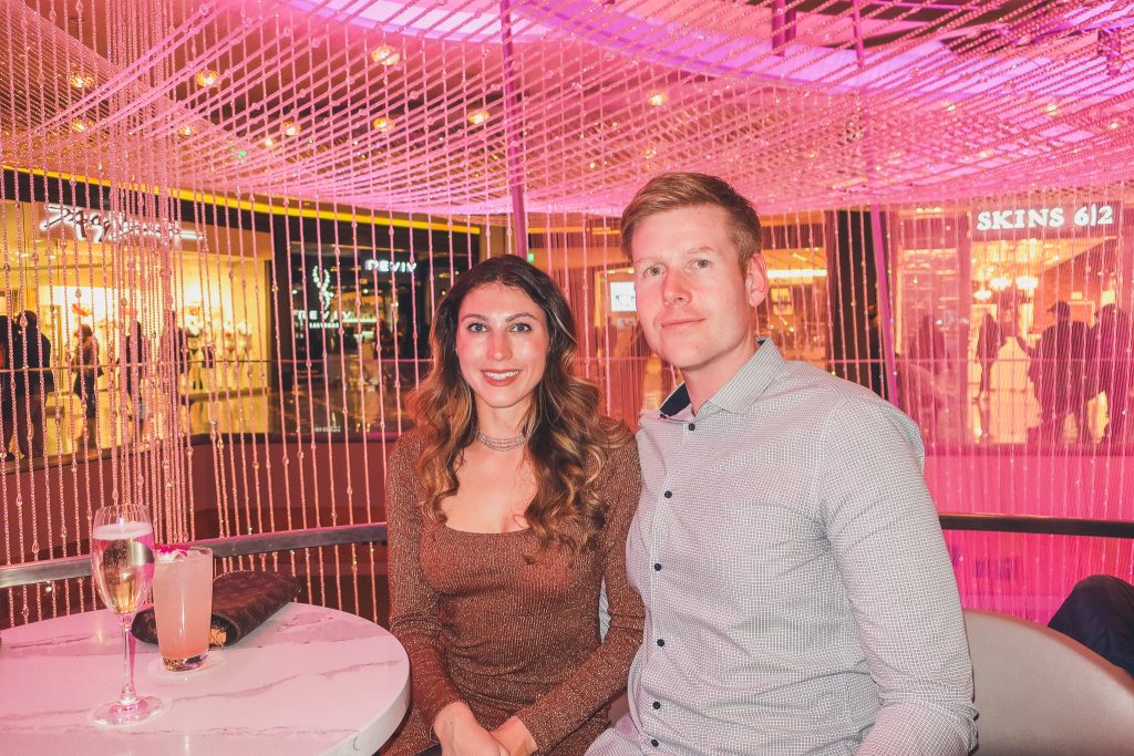 couple at Chandelier Bar at Cosmo Hotel in Las Vegas