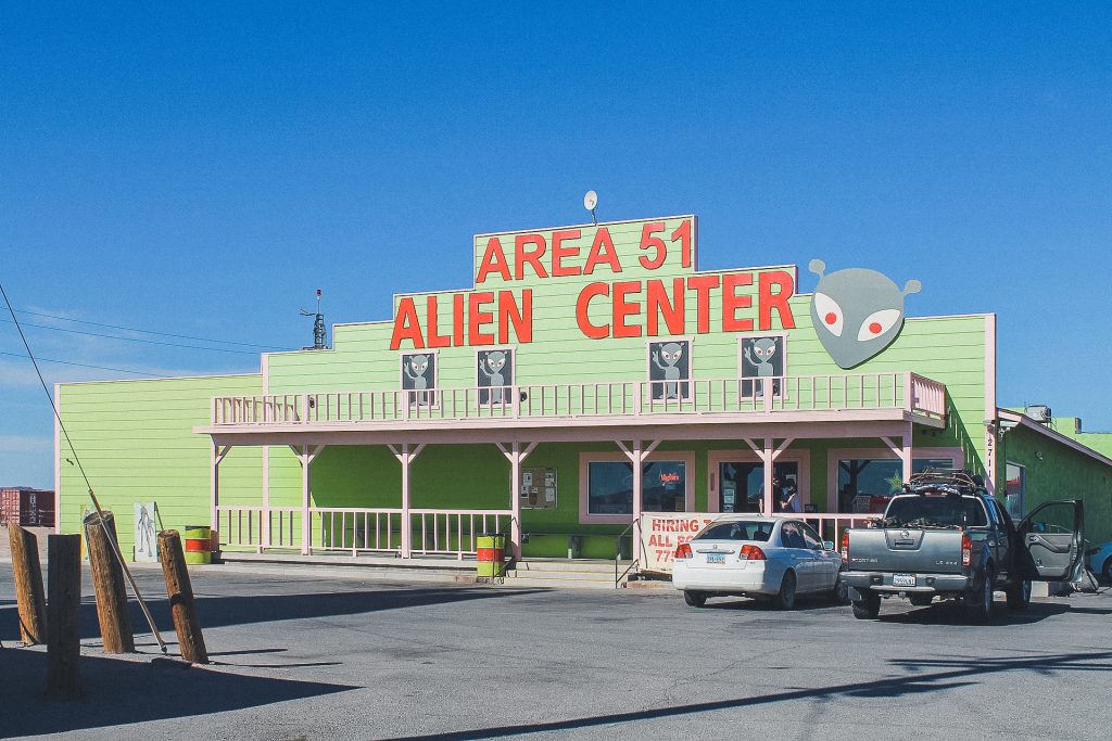 green building that reads "area 51: alien center."