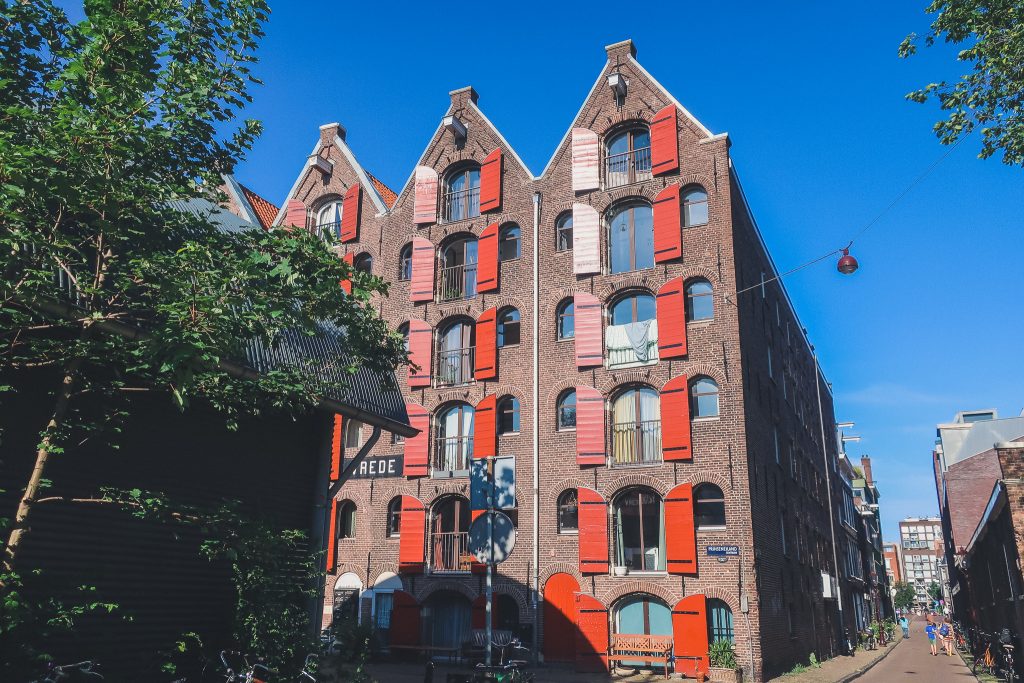 Iconic red shutters on canal homes in prinseneiland in amsterdam 