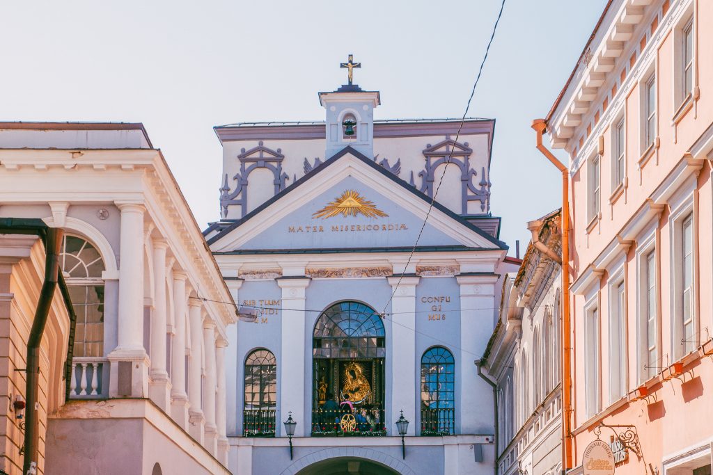  People are at Chapel with Ostrobramskaya Icon of Mother of God at Holy Gates, Gate of Dawn, Vilnius, Lithuania