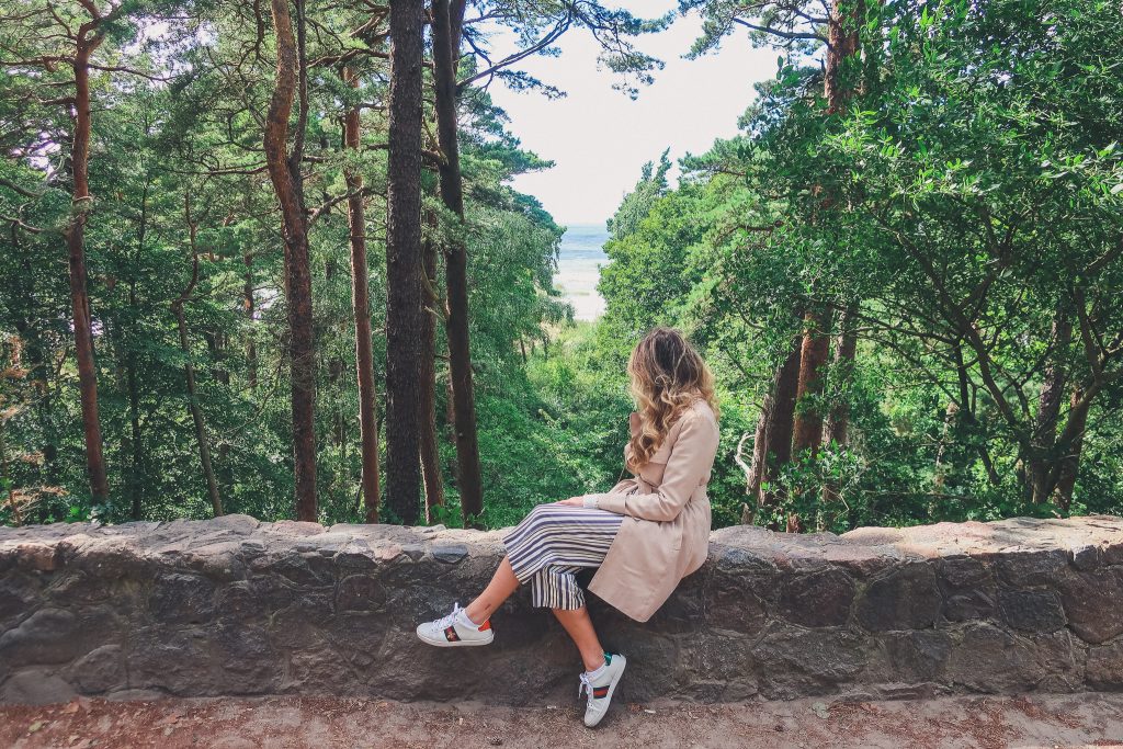 girl looks out at sea from top of Birutė Hill.