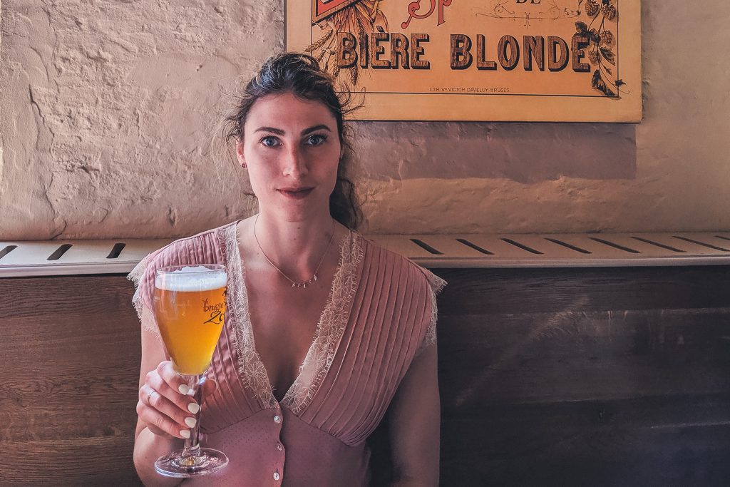 girl Drinking beer in bruges