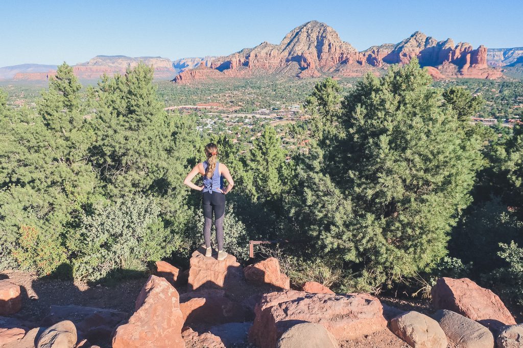 Girl Looks out from Airport Mesa Scenic Lookout in Sedona