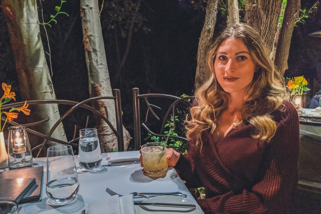 Girl dines at Cress on the Creek in L'auberge de Sedona