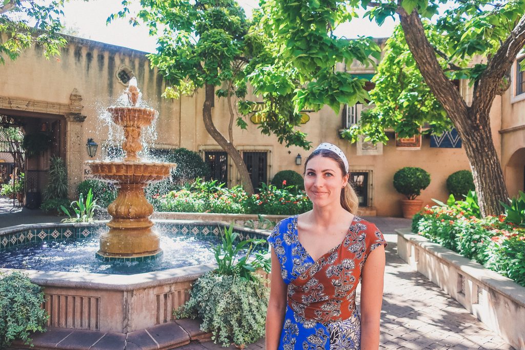 girl stands in Tlaquepaque Arts and Crafts Village