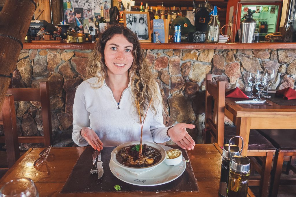 girl wears quarter zip sweater out to dinner in Patagonia 