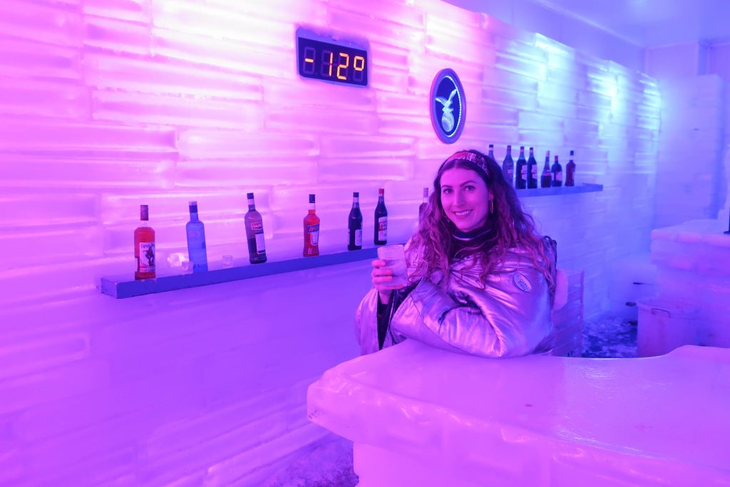 woman at ice bar in Patagonia 