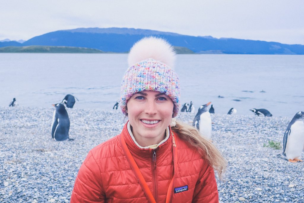 girl wearing pom hat