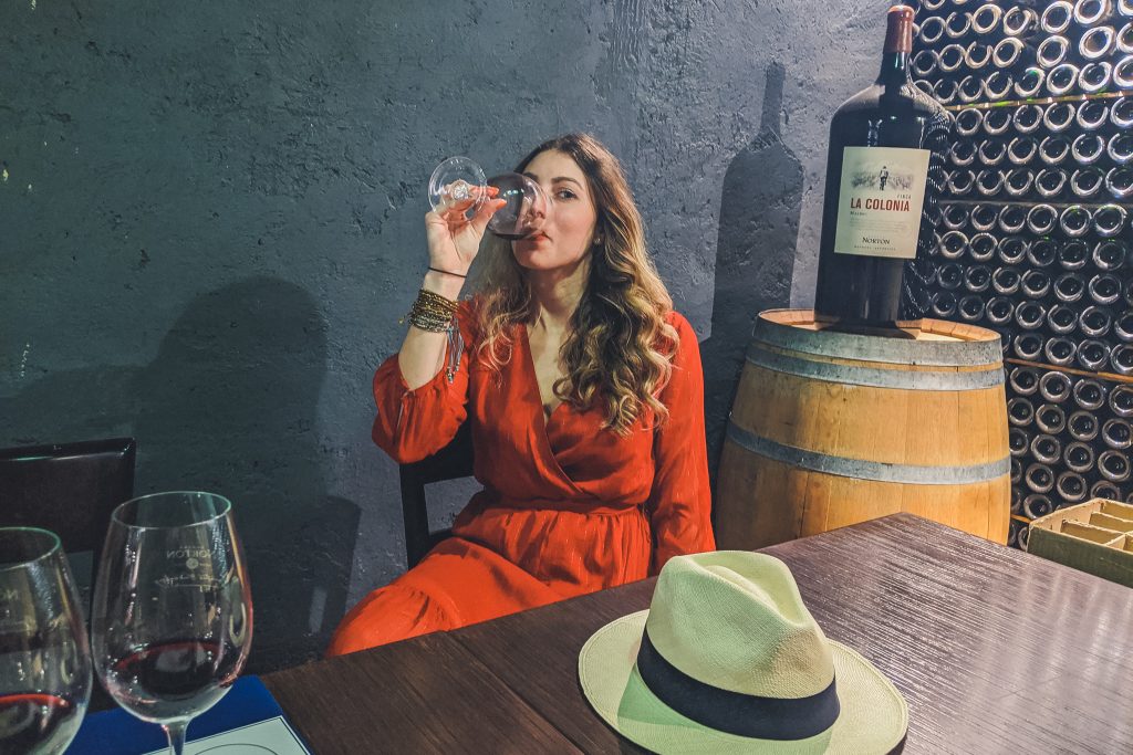 woman tastes wine at Bodega Norton in Lujan de Cuyo