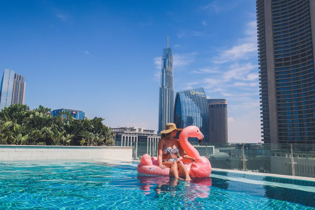 woman wears modest swimsuit at Sofitel in downtown Dubai