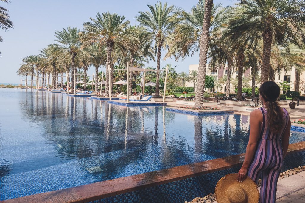 woman wears jumpsuit to pool in Abu Dhabi