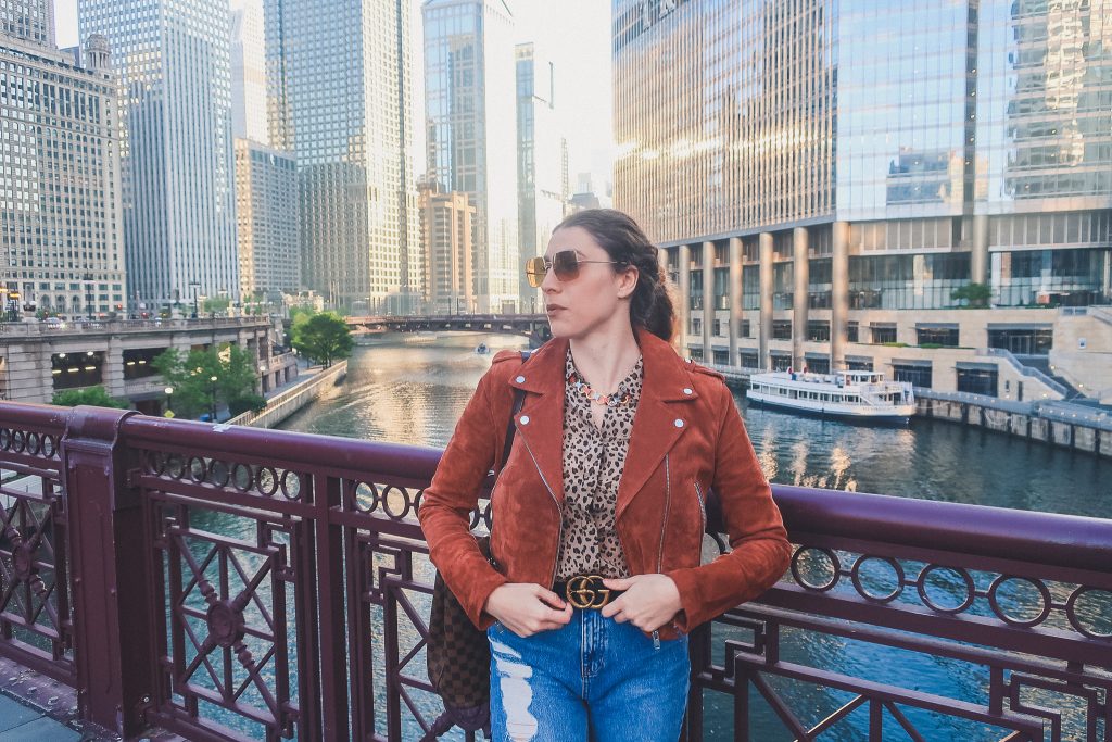 woman in Chicago wears suede jacket 