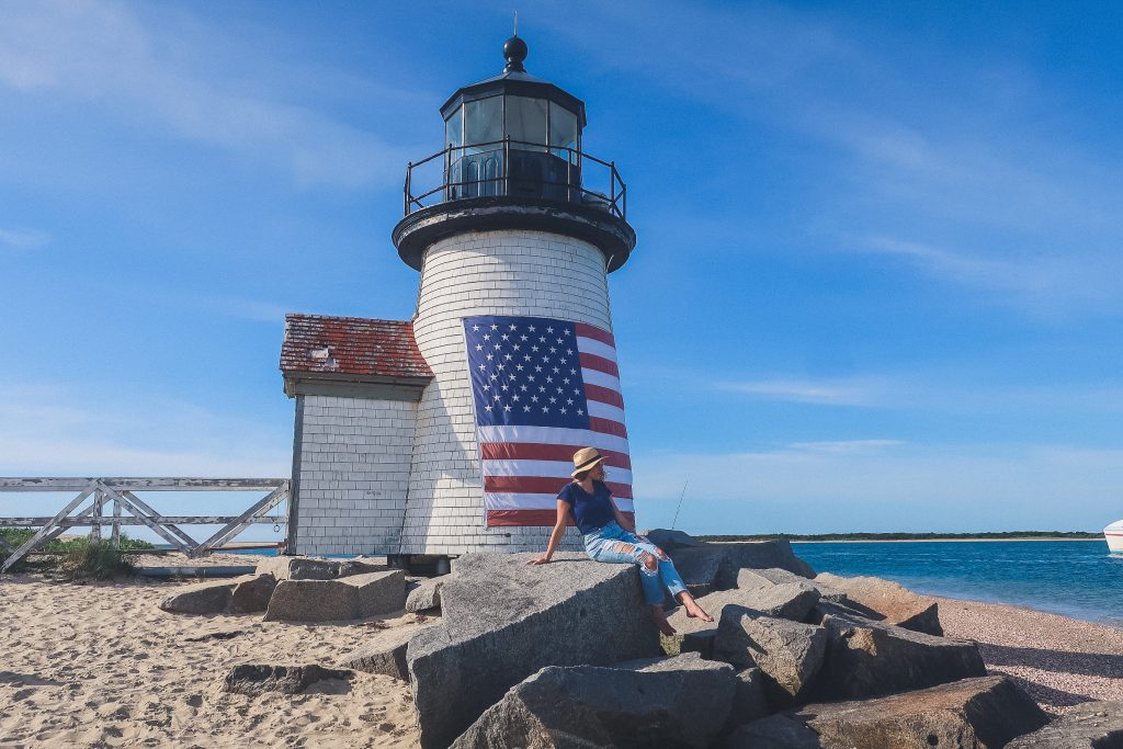 woman at Brant Point Lighthouse in Nantucket