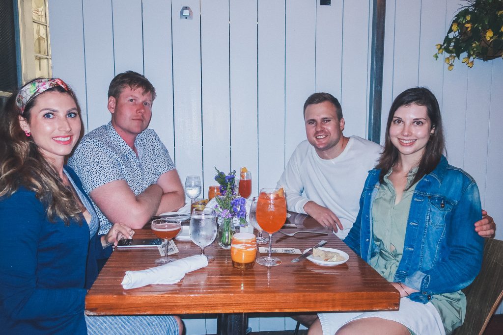 group of friends dines at Dune Nantucket