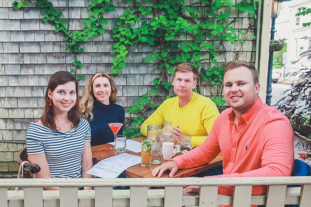 group of friends dines at the Proprietors Bar & Table in Nantucket