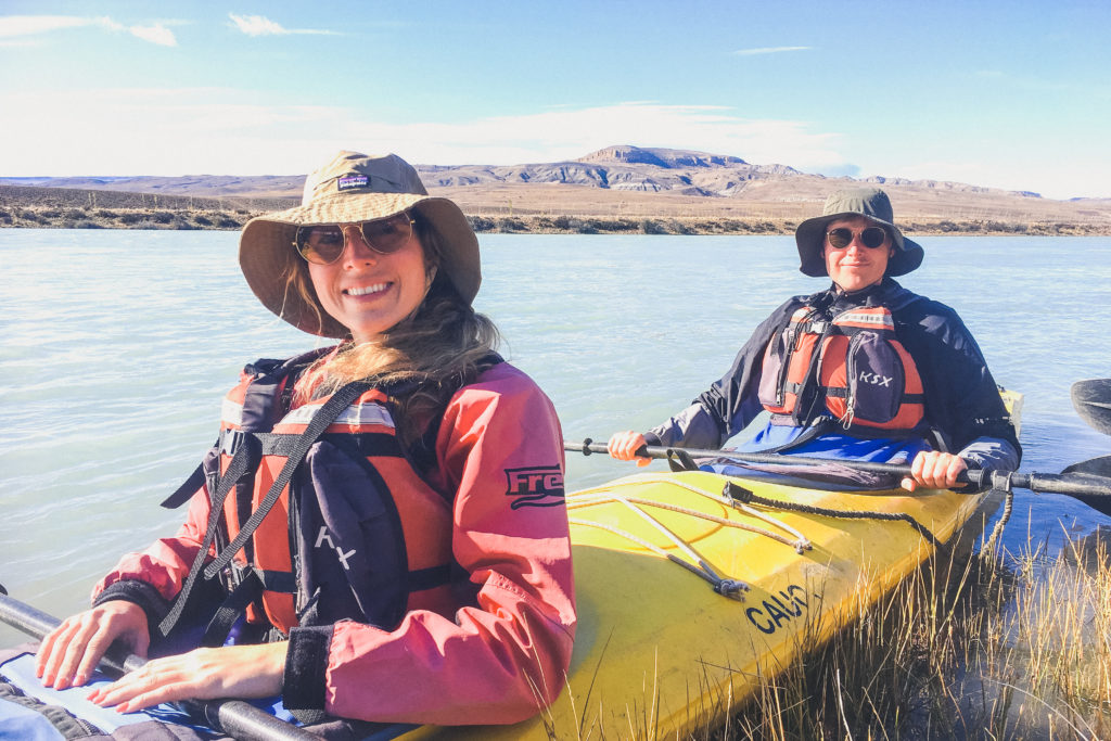 couple about to kayak through mild rapids along the La Leona River.