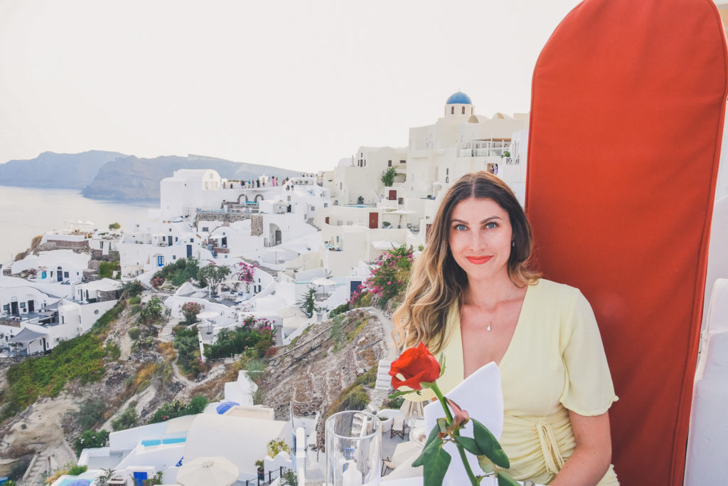woman dining out in Oia santorini