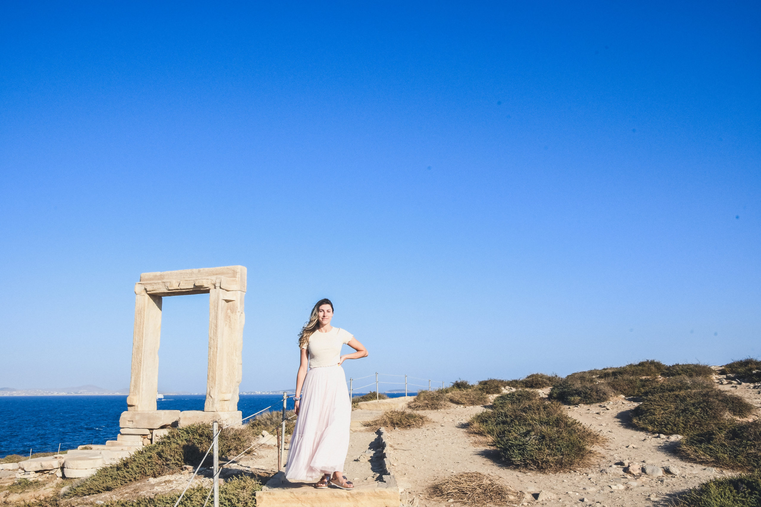 woman near Temple of Apollo in Naxos Greece